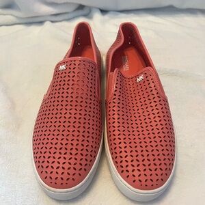 Michael Kors Women’s coral pink Slip-On Shoes